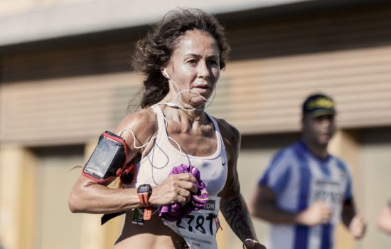 A triathlete performing very well after training recovery using CBD triathlete products