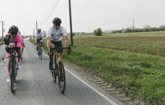 Two cycling athletes performing outdoors at CBD Triathlete